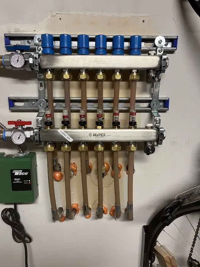 Plumber performing Water Heater Repair at a residential property in Rockford